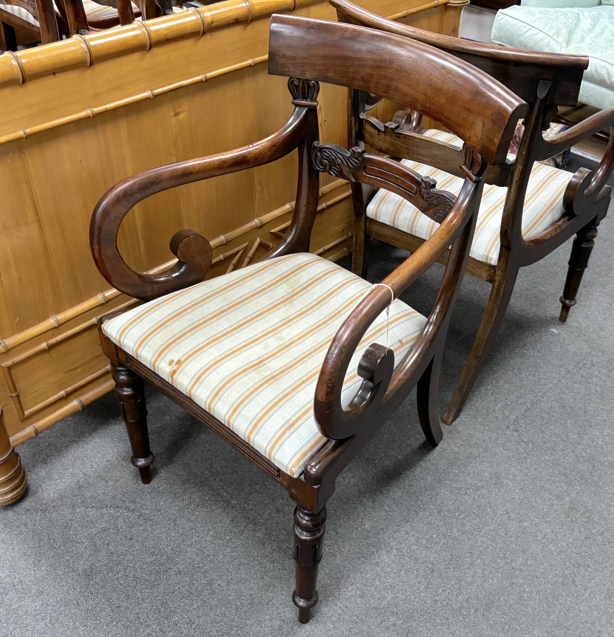 A set of eight William IV mahogany dining chairs, two with arms